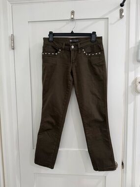 Levi’s olive green  524 superlow skinny studded jeans (fair condition)